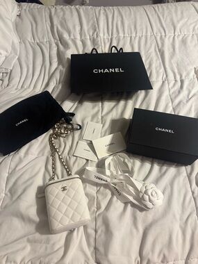 Brand new never worn 100% authentic Chanel Vertical Vanity bag in white
